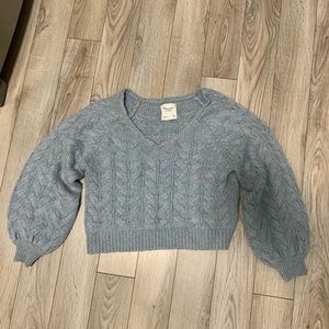 Cropped blue cable knit sweater